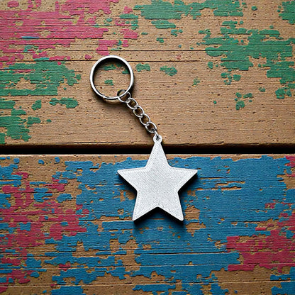 Handmade and customizable star keychain in silver, made from eco PLA plastic, ideal for classroom prizes, rewards, events, kids, and party favors.