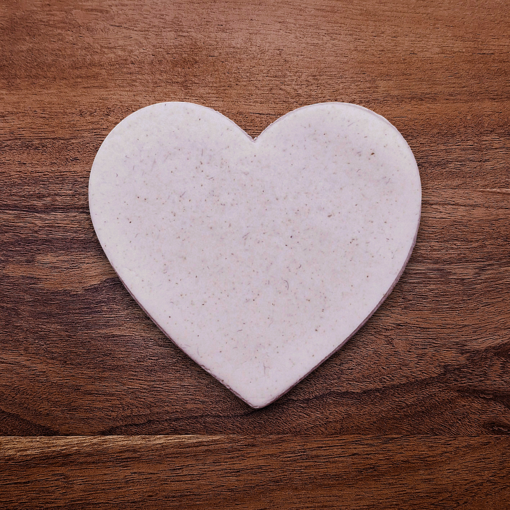 Heart-shaped cookie cutter making a clean cutout in dough – perfect for baking, Valentine’s cookies, fondant, or crafting with food-safe plastic cutter.
