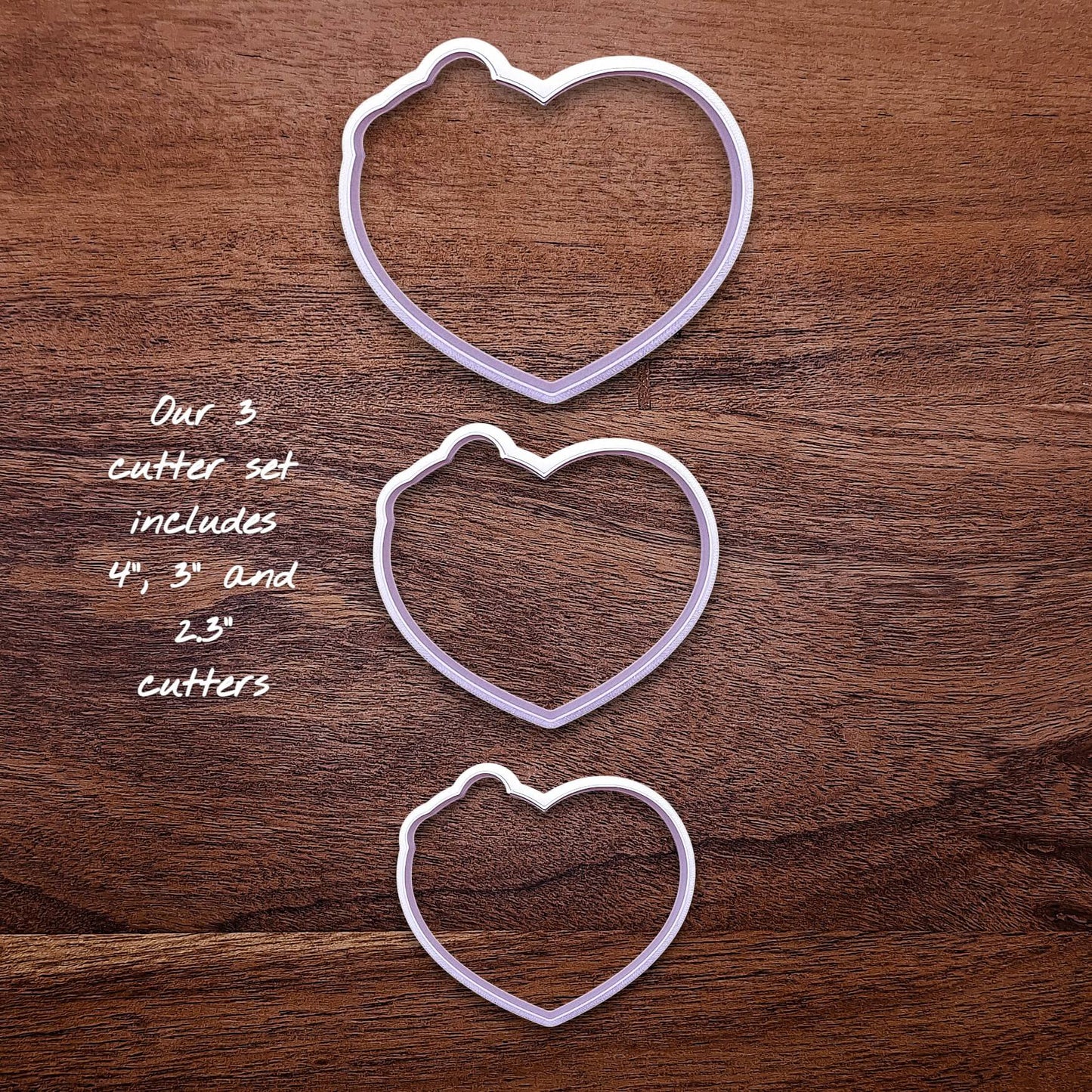 Three heart-shaped cookie cutters in small, medium, and large sizes shown without stamps—perfect for simple and themed baking projects.