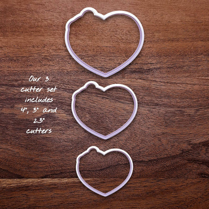 Three heart-shaped cookie cutters in small, medium, and large sizes shown without stamps—perfect for simple and themed baking projects.