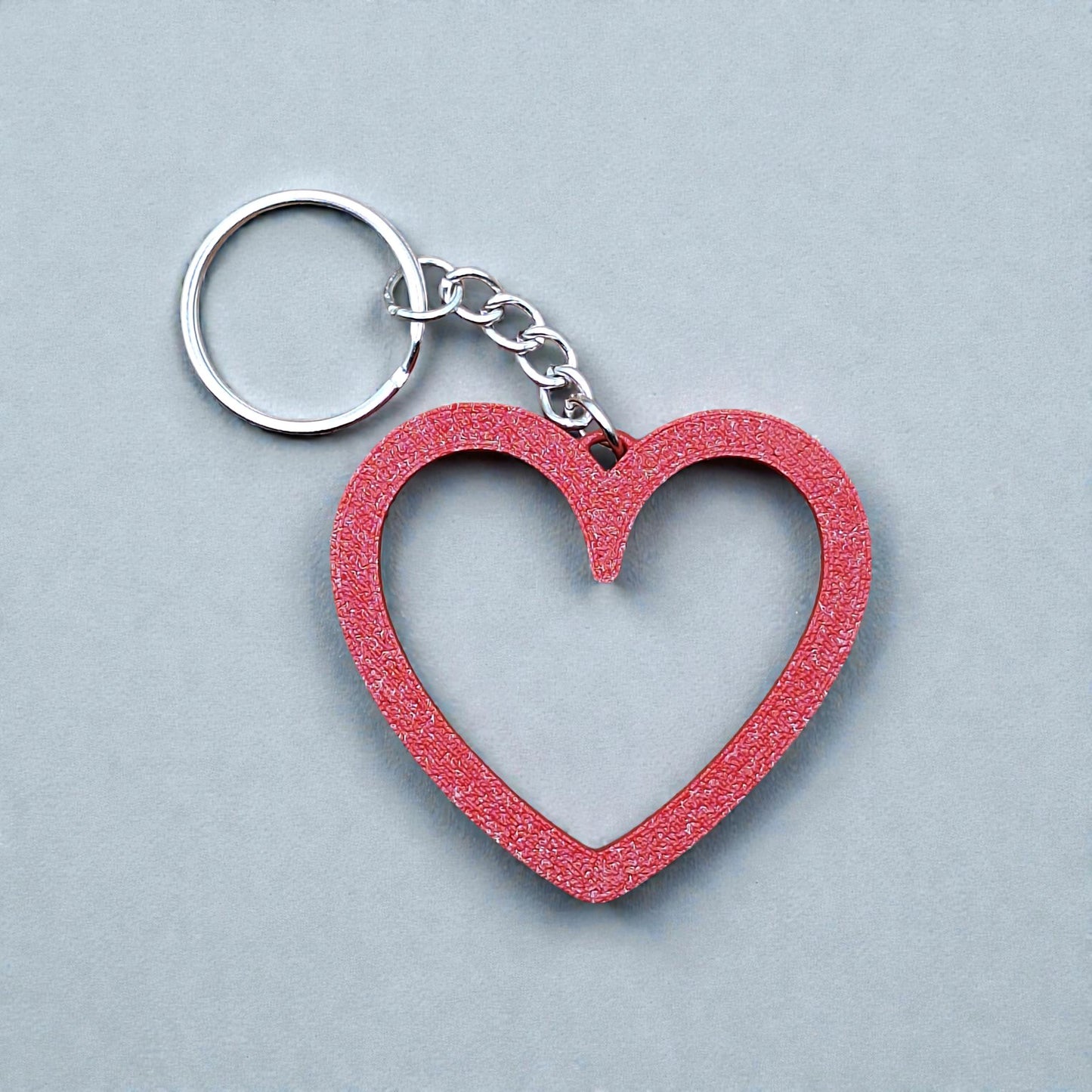 Heart keychain shown in maroon red, perfect for Valentine's Day gifts, wedding party favors, stocking stuffers and class prizes.