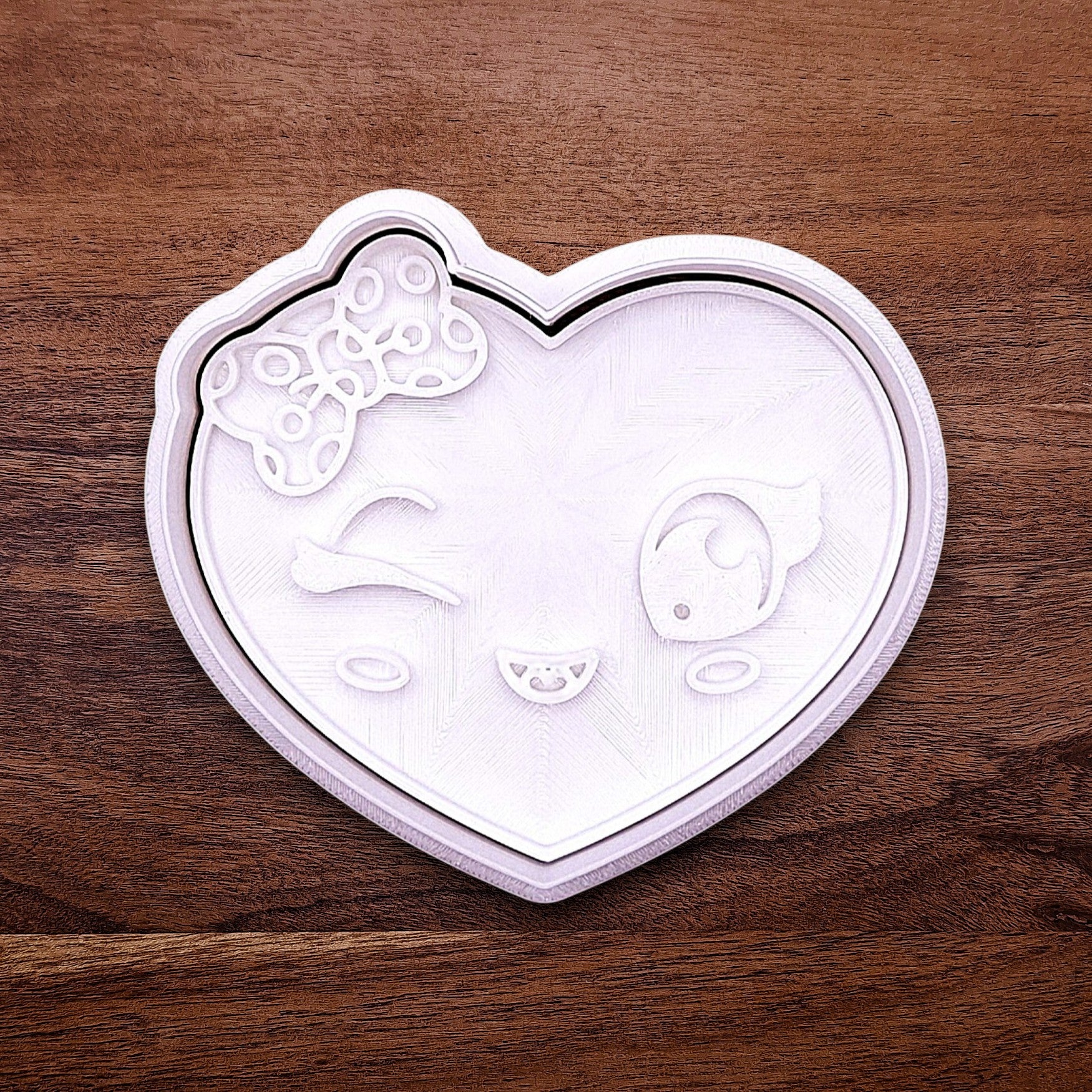 Heart cookie cutter stamp with girly face imprint, perfect for Valentine’s Day cookies, weddings, parties, fondant, and fun DIY baking projects.