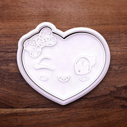 Heart cookie cutter stamp with girly face imprint, perfect for Valentine’s Day cookies, weddings, parties, fondant, and fun DIY baking projects.