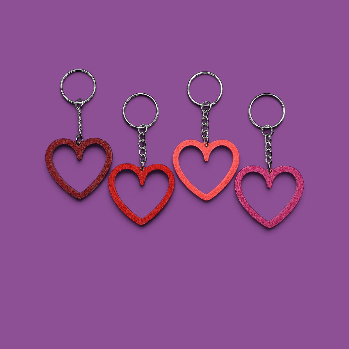 Eco-friendly heart keychains, perfect for Valentine's Day gifts, wedding party favors, stocking stuffers and class prizes.