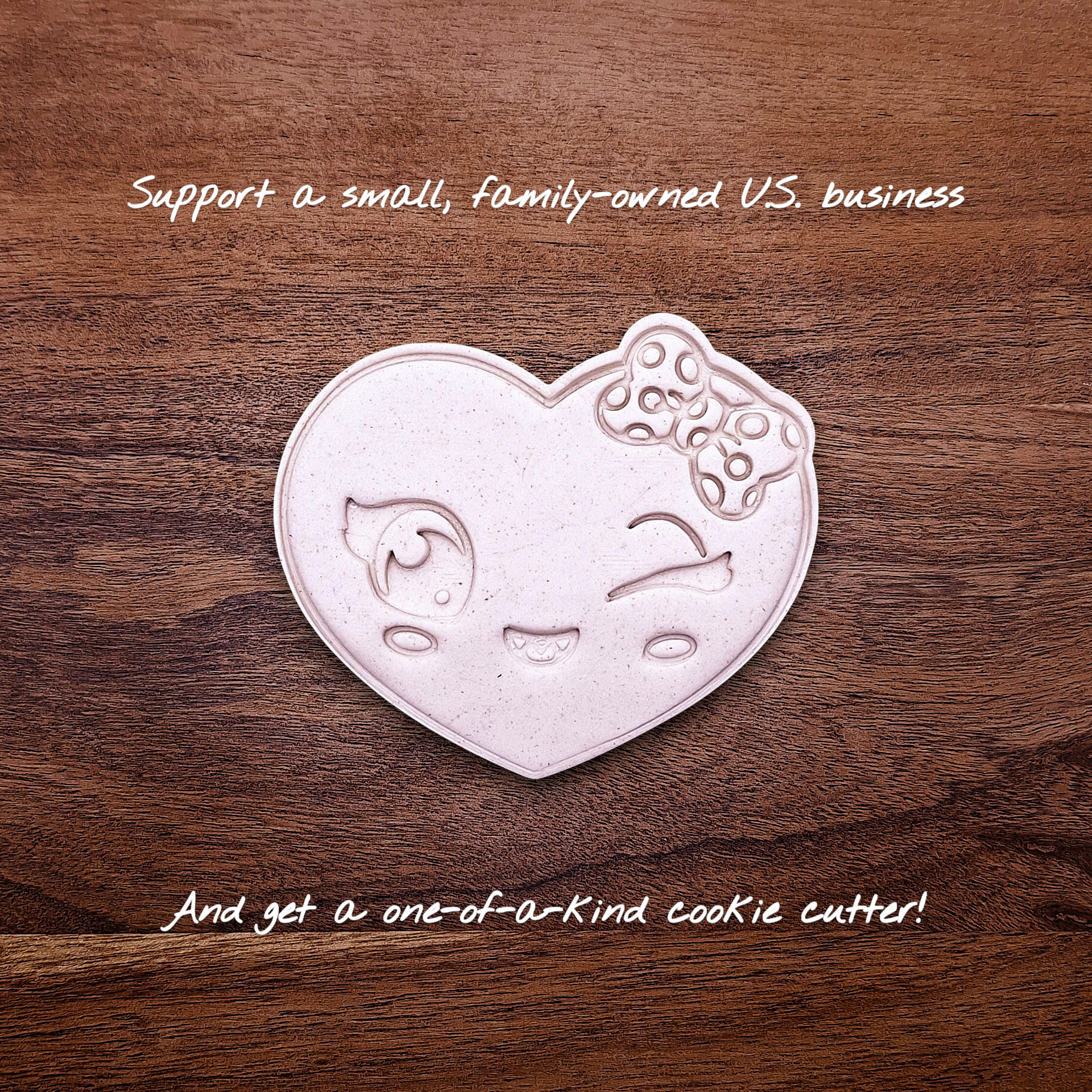 Heart cookie cutter dough cutout with smiley face imprint, perfect for Valentine’s Day cookies, wedding favors, and fun DIY baking projects.