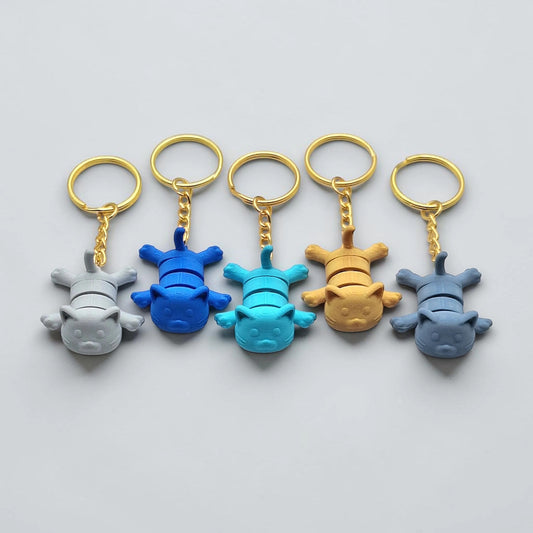 Cat keychains in assorted colors, customizable and handmade, perfect for classroom prizes, party favors and event giveaways.