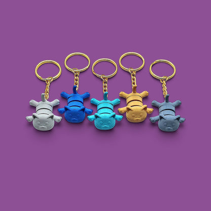 Cat keychains in assorted colors, customizable and handmade, perfect for classroom prizes, party favors and event giveaways.