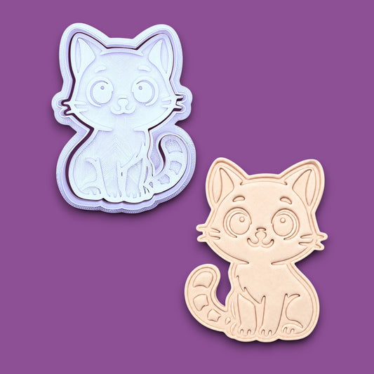 Customizable cat cookie cutter and stamp alongside a cat dough cutout and imprint, perfect for kitty cookie designs, fondant toppers, birthday parties, crafts or cat themed baking projects.