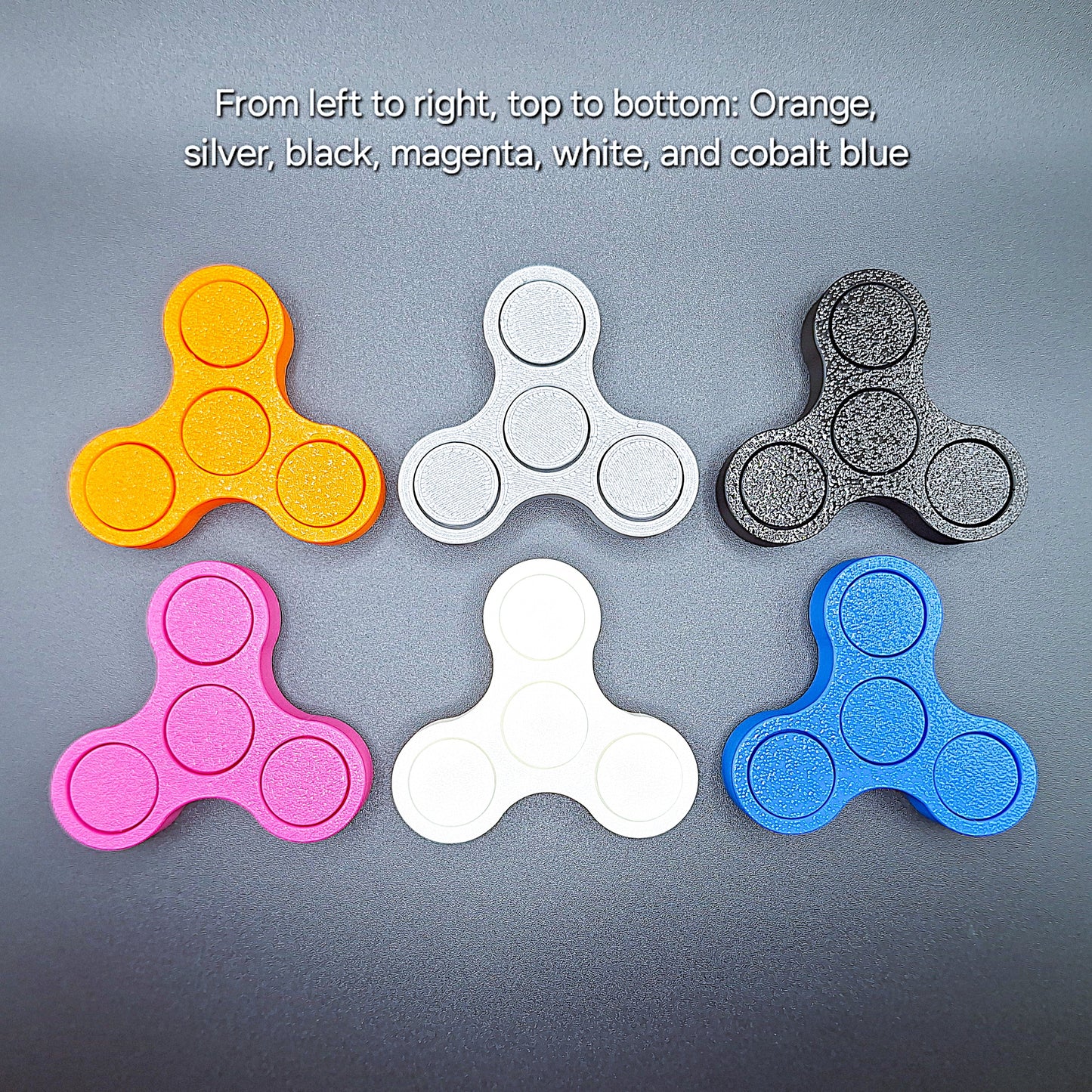 Top view of eco-friendly mini fidget spinners in six colors, handmade in the USA and ideal for stress relief, classroom focus, or mindful play.