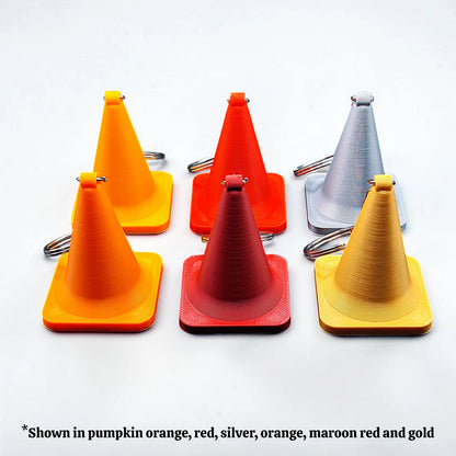 Colorful traffic cone keychains, showing detailed shape and eco PLA material, ideal for gag gifts or themed sets.