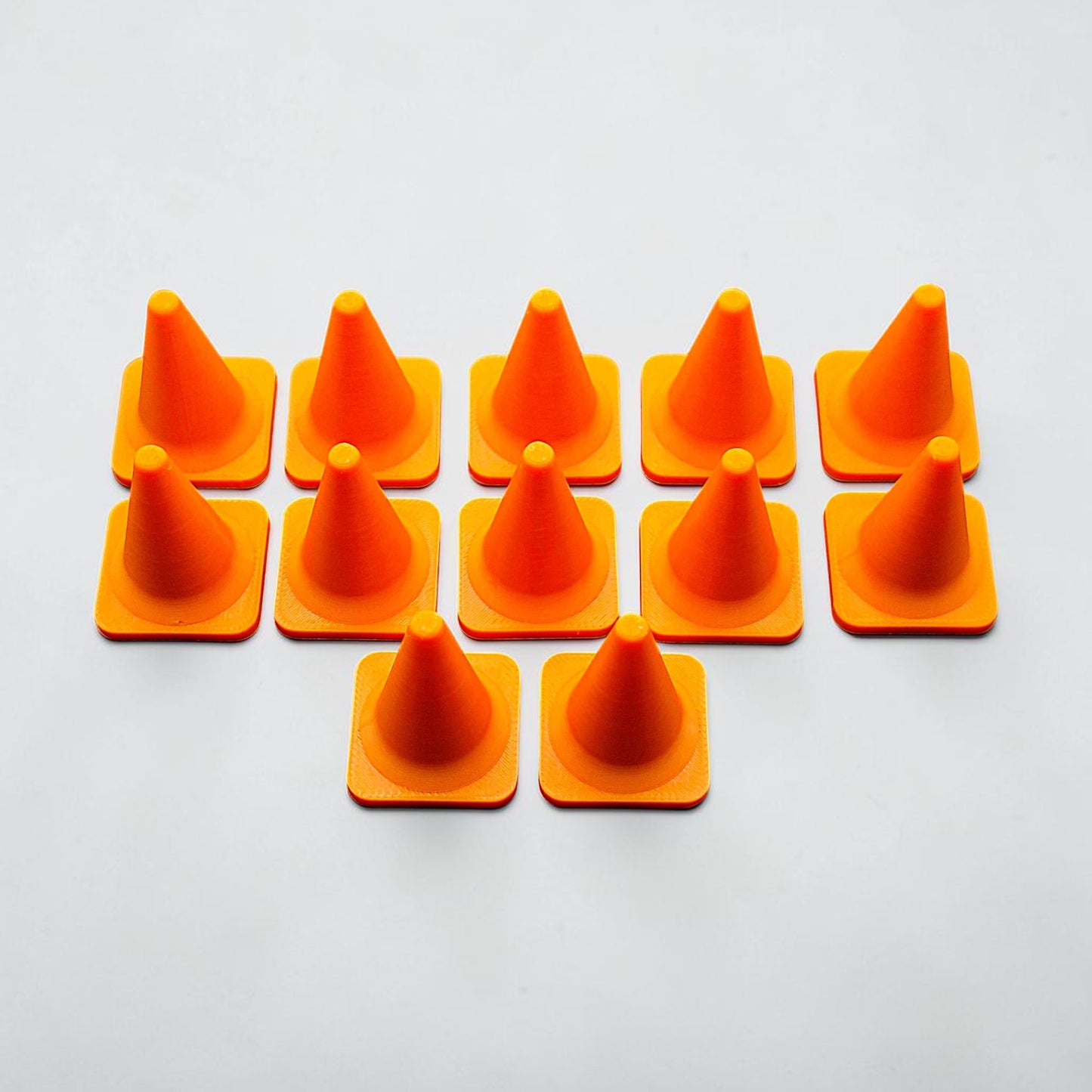 Customizable mini traffic cone set, perfect for pretend play, party favors, classroom games, sports drills, crafts, or playful tabletop decorations.