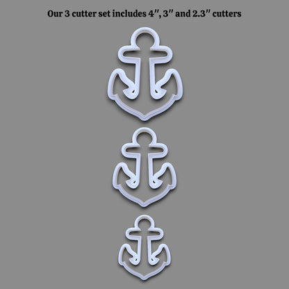 Three white anchor-shaped cookie cutters shown vertically on a gray background, with black text at the top reading 'Our 3 cutter set includes 4", 3", and 2.3" cutters'.