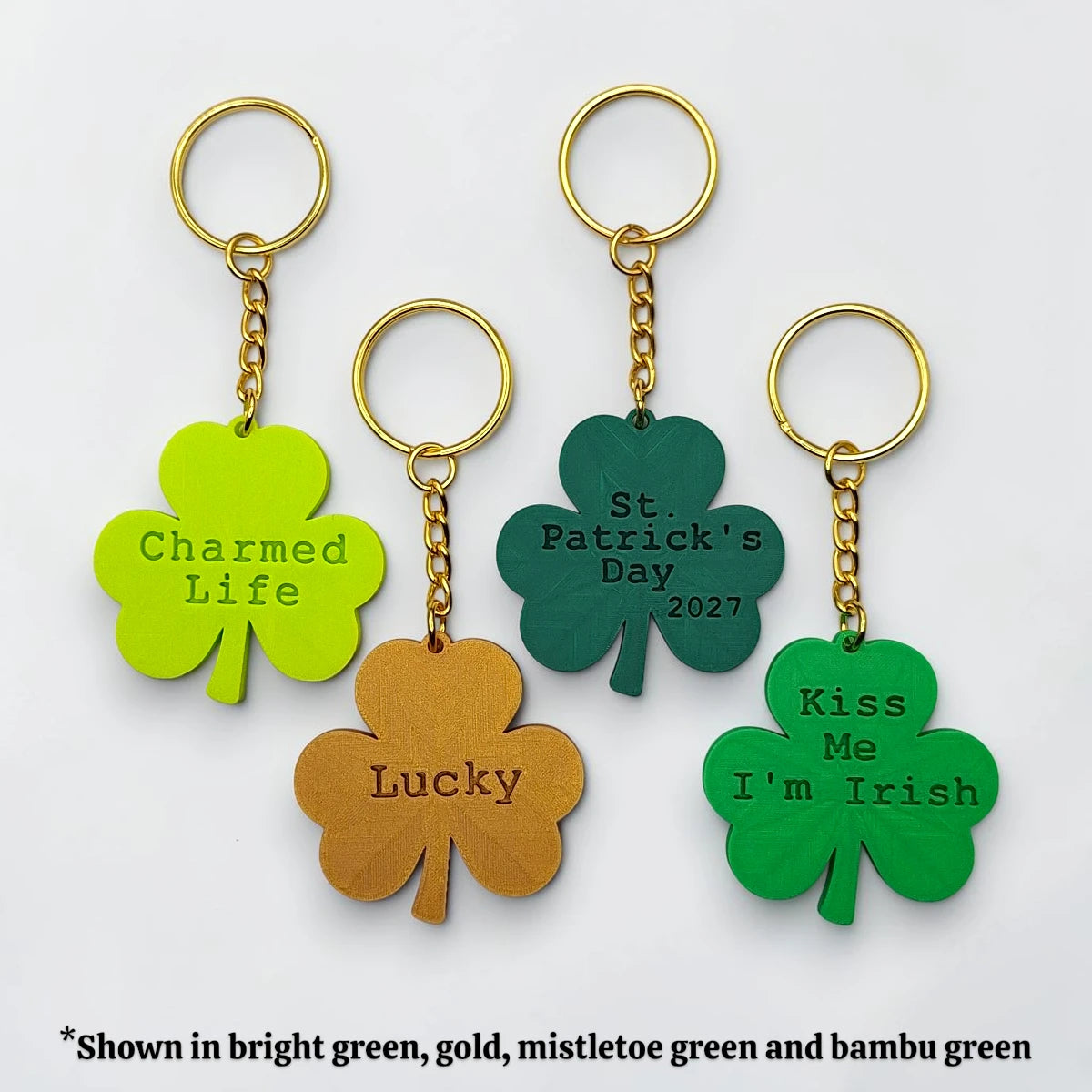 Personalized and engraved Shamrock keychains showing a three leaf clover charm, perfect for Irish gifts, St. Patrick's Day events, giveaways and family reunions.