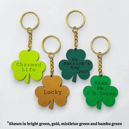Personalized and engraved Shamrock keychains showing a three leaf clover charm, perfect for Irish gifts, St. Patrick's Day events, giveaways and family reunions.