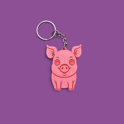 Handmade and customizable pig keychain in pink with silver keyrings, ideal for country themed party favors, cute farm animal bag charms, and classroom prizes.