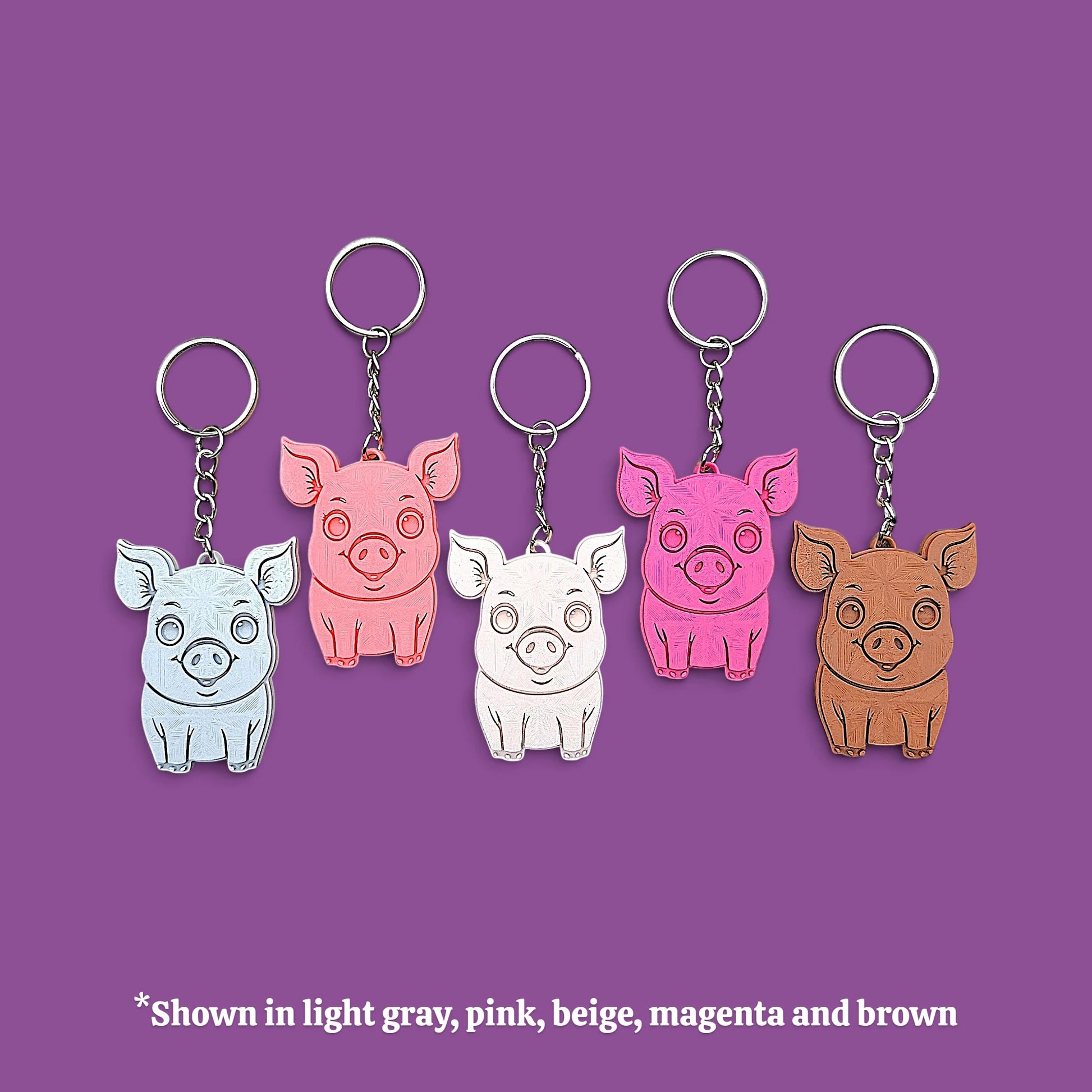 Handmade and customizable pig keychains in five colors with silver keyrings, ideal for country themed party favors, cute farm animal bag charms, and classroom prizes.