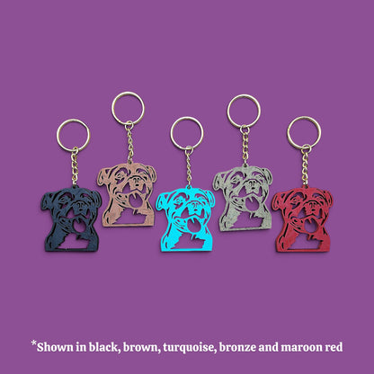 Front of handmade and customizable pit bull keychains in multiple colors, perfect for pittie owners, pitbull lovers, party favors, and unique bag charms.