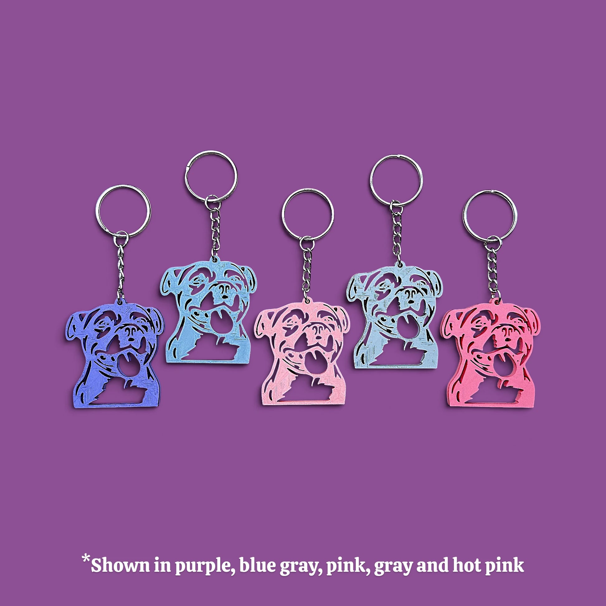 Reverse of handmade and customizable pit bull keychains in multiple colors, perfect for pittie owners, pitbull lovers, party favors, and unique bag charms.