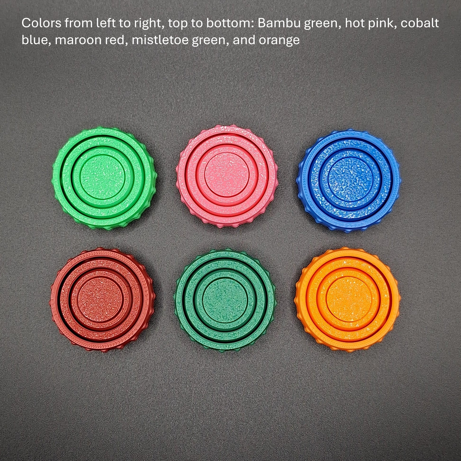 Six pocket-sized fidget gyro spinners in assorted colors, perfect for stress relief, focus, and quiet play, handmade from eco-friendly plastic.