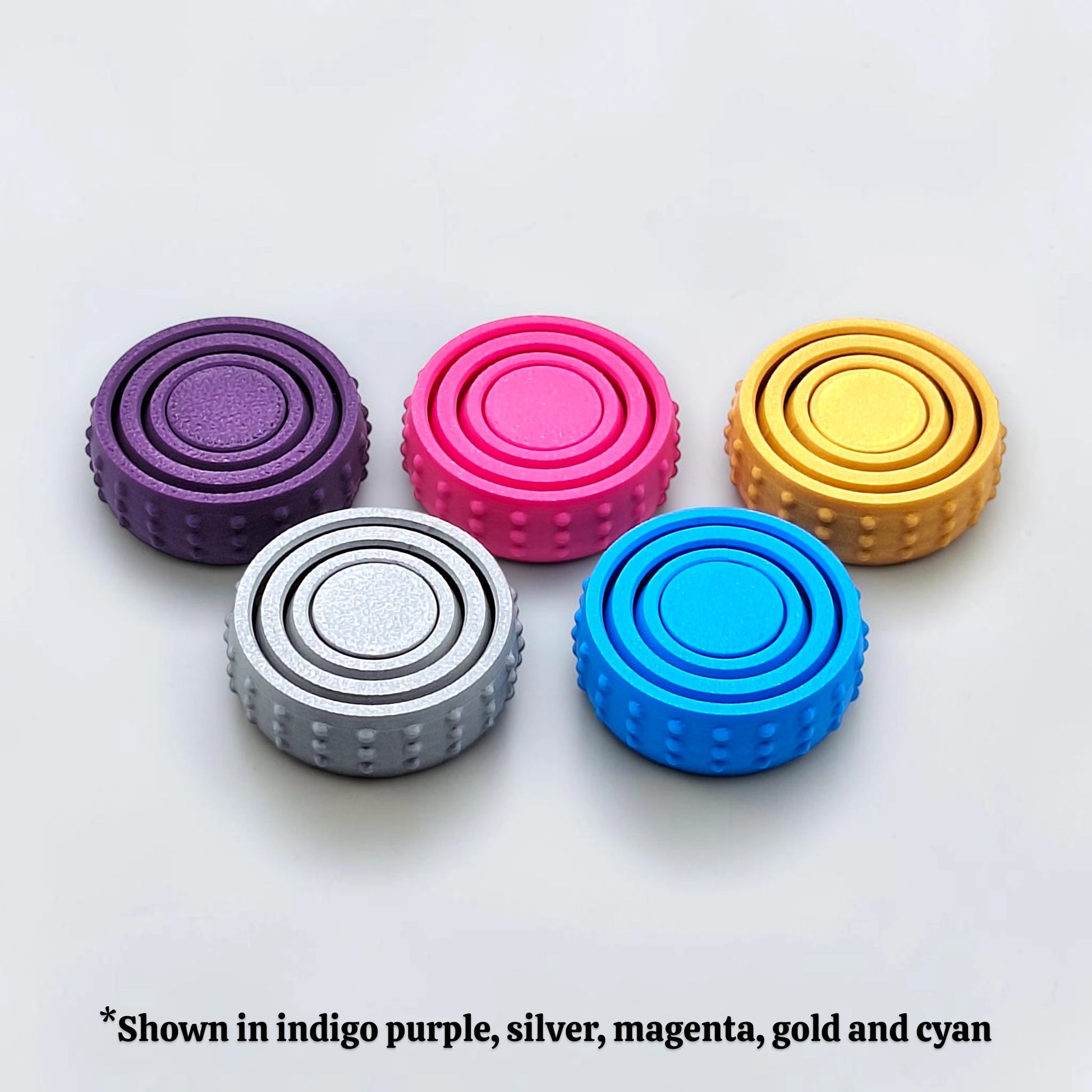 Bulk fidget and gyro spinners in unique colors, perfect for party favors, event giveaways, classroom prizes and promotional items. Customizable in 30 colors and handmade in USA.
