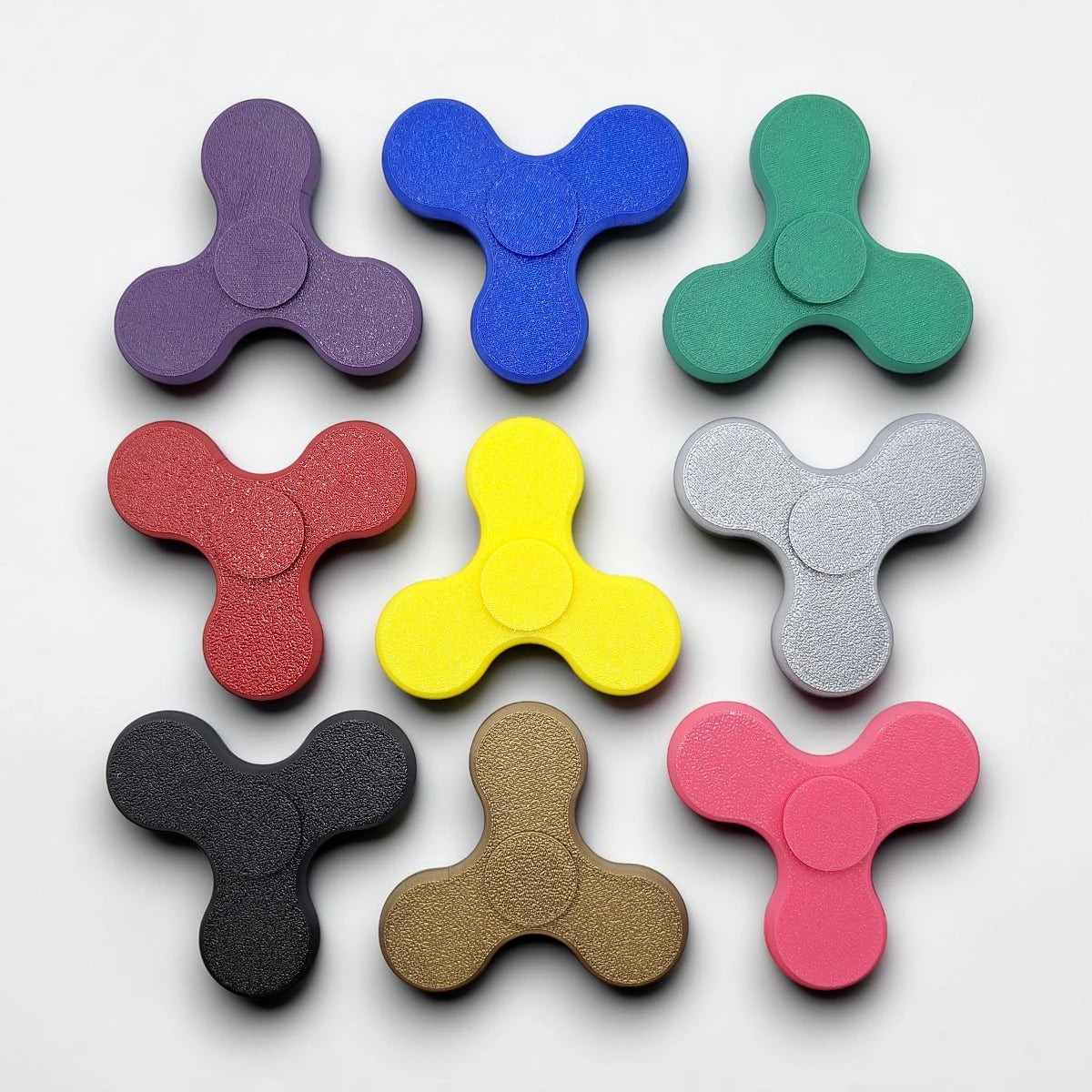 Multiple fidget spinners in various colors, perfect for party favors, birthday gifts and classroom rewards. Customizable in 30 unique colors.