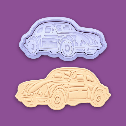 Vintage punch buggy car cookie cutter with stamp alongside a dough cutout and imprint, perfect for car themed birthdays, ceramics, ornaments and clay projects.