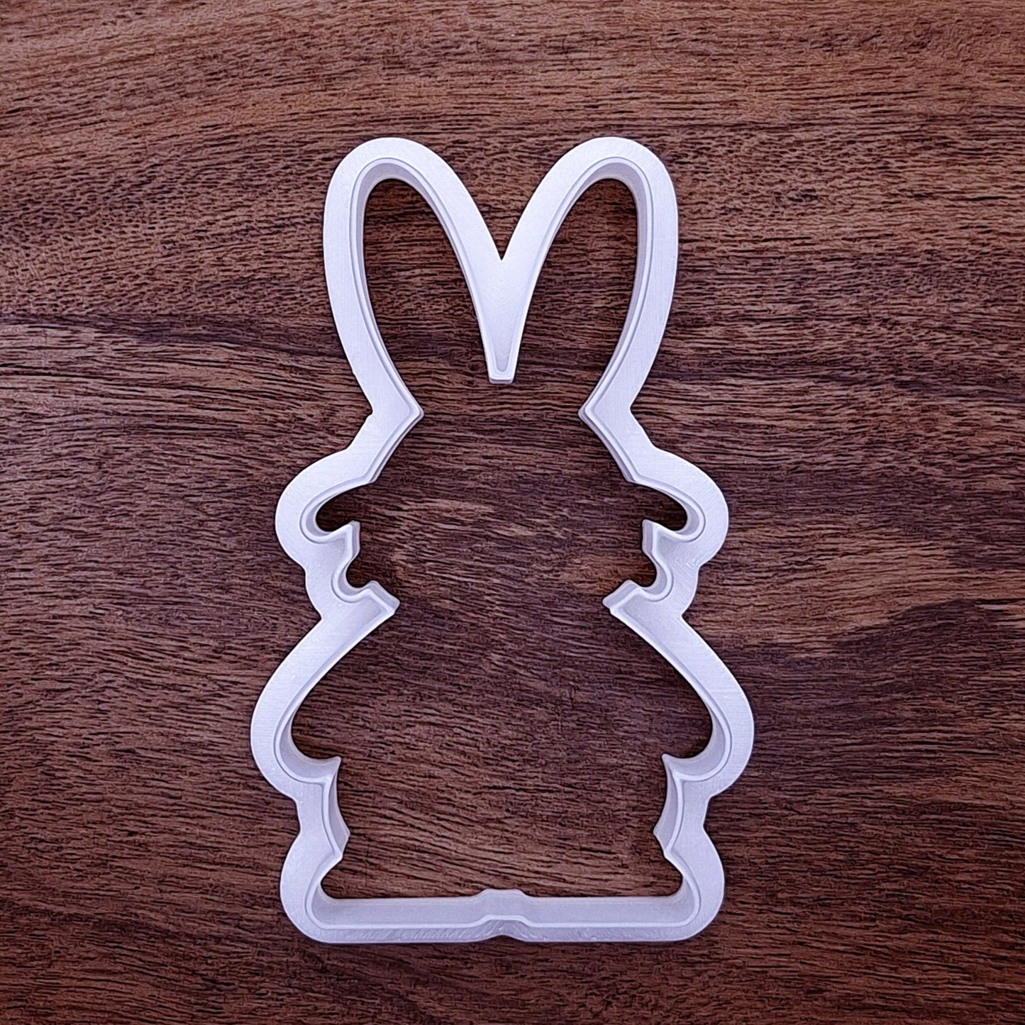 Rabbit-shaped cookie cutter without stamp. Perfect for bold animal-themed cookie creations or crafts.