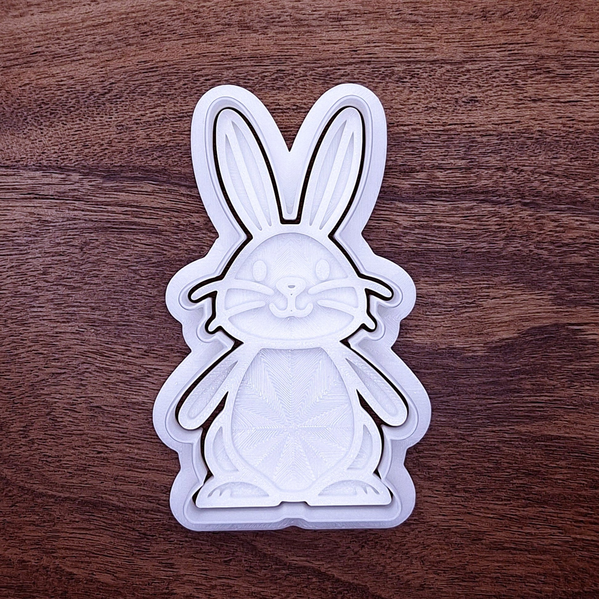 Rabbit cookie cutter with matching stamp for easy detailed cookies. Ideal for woodland or pet rabbit baking themes.