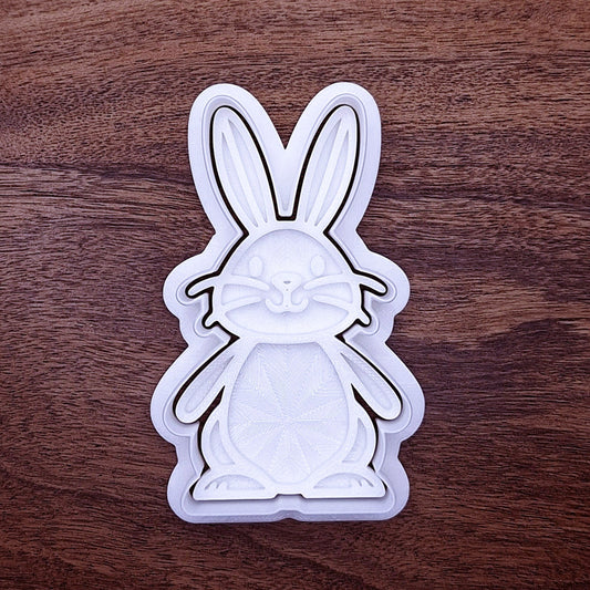 Rabbit cookie cutter with matching stamp for easy detailed cookies. Ideal for woodland or pet rabbit baking themes.