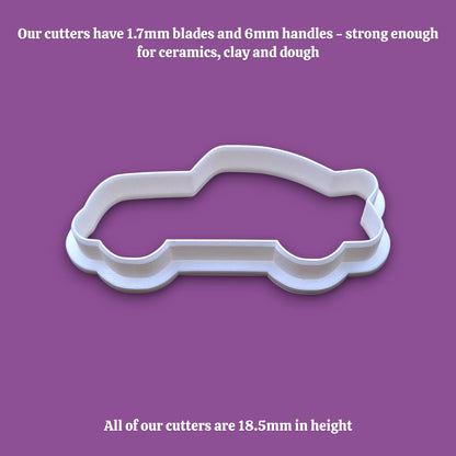 Racecar cookie cutter alongside dimensions for the cutter, ideal for bakers looking for racecar-themed baking tools and cutters.