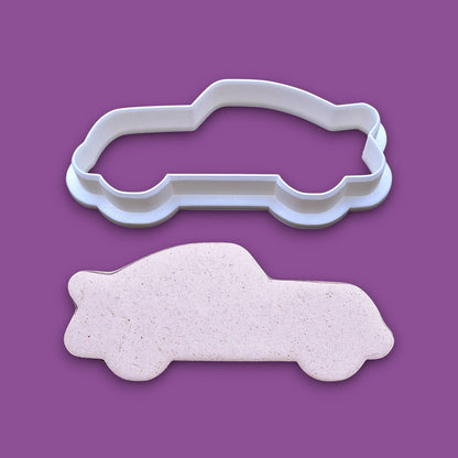 Racecar cookie cutter and dough cutout, perfect for racing-themed birthday treats, car cookies, or fun fondant decorations.