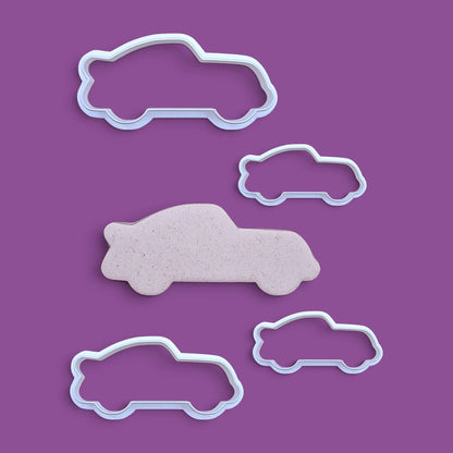 Racecar cookie cutters and dough cutout, perfect for racing-themed birthday treats, car cookies, or fun fondant decorations.