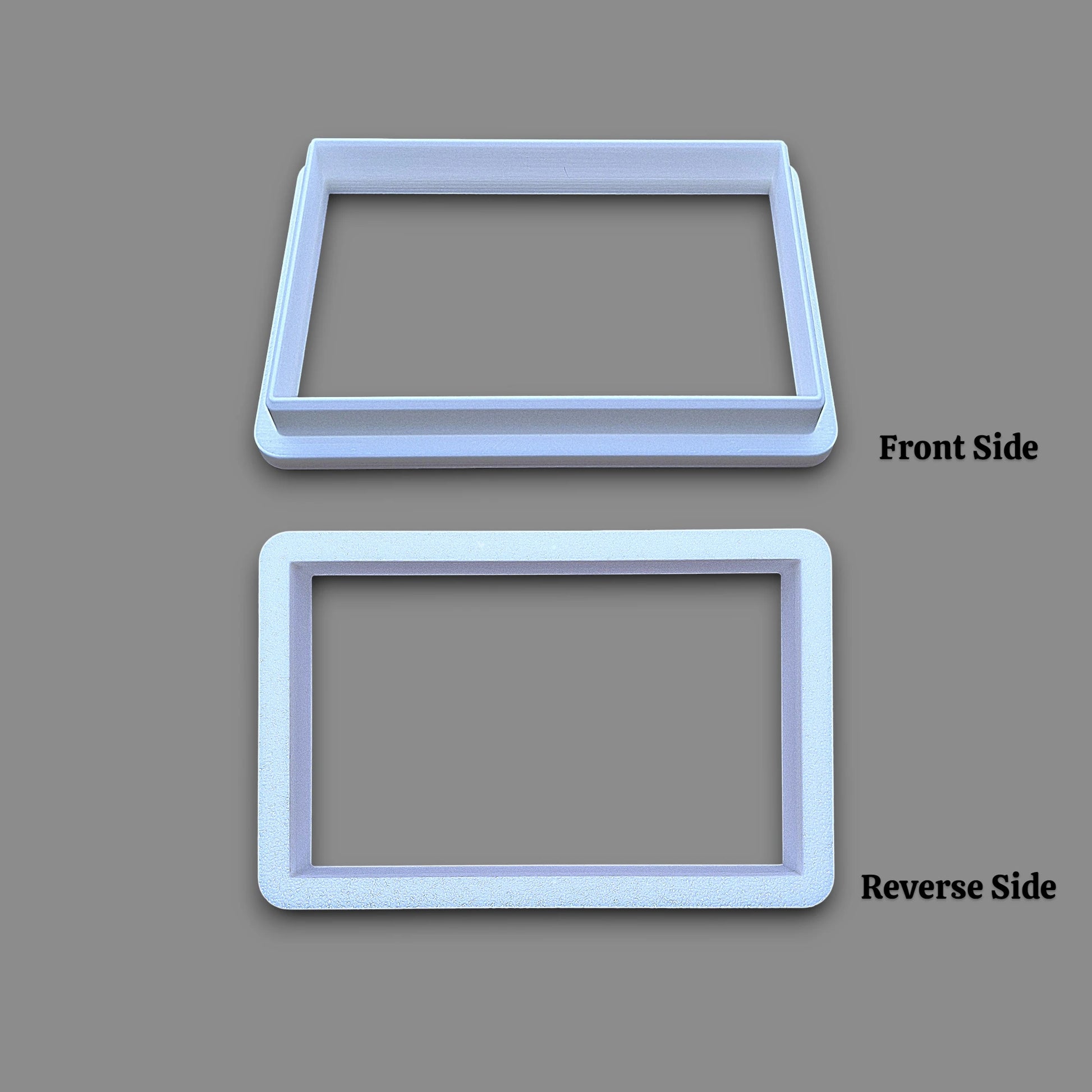 A rectangular cookie cutter on a gray background, labeled 'Front Side' and 'Reverse Side' to indicate the two sides of the product.