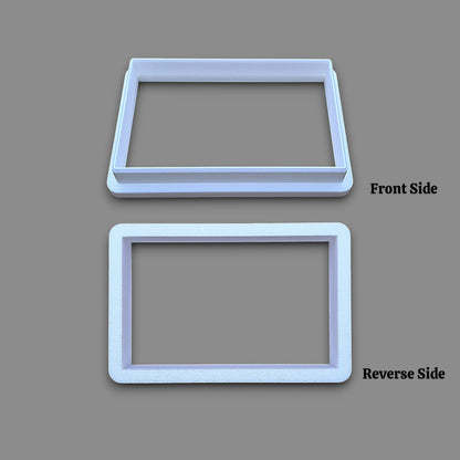 A rectangular cookie cutter on a gray background, labeled 'Front Side' and 'Reverse Side' to indicate the two sides of the product.
