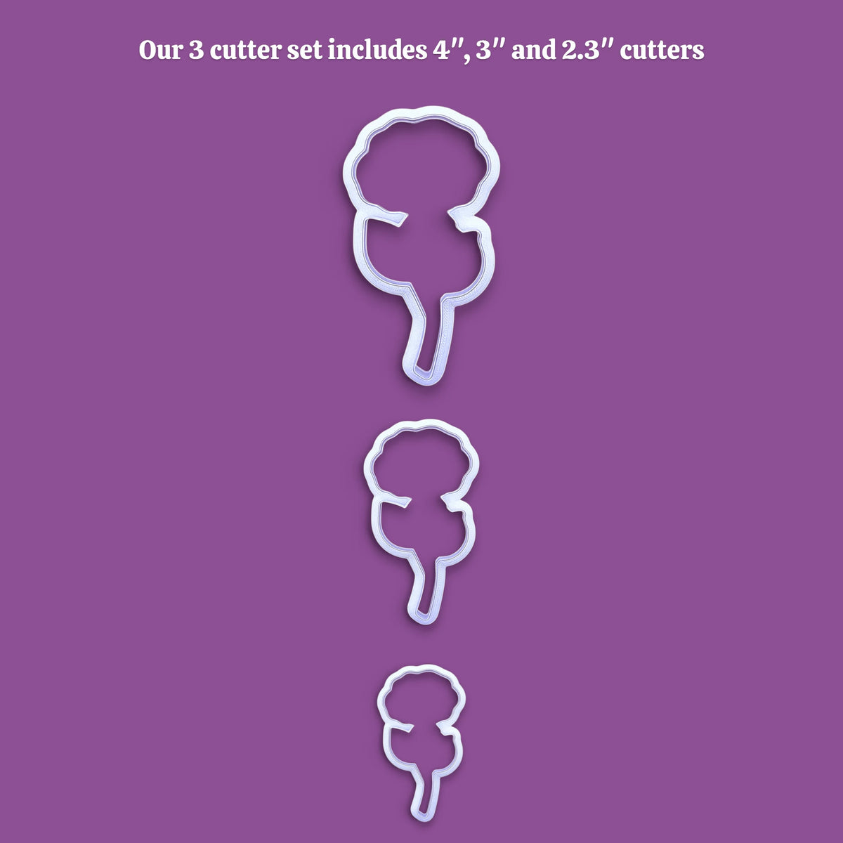 Three white plastic cookie cutters in descending sizes are displayed vertically on a solid purple background, with white text at the top reading 'Our 3 cutter set includes 4", 3", and 2.3" cutters'.