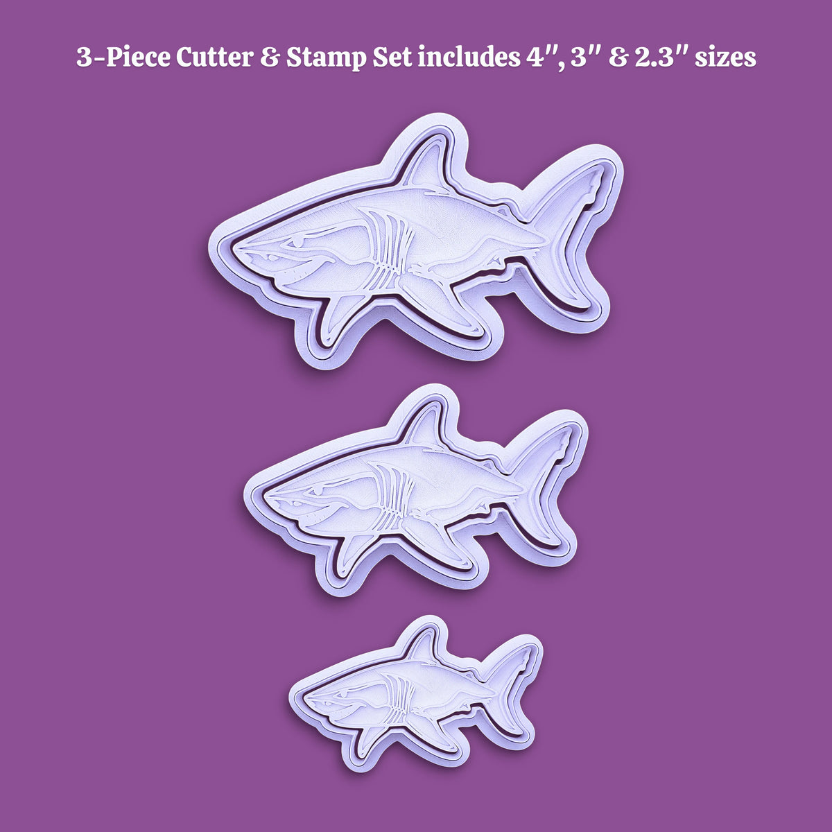 Three shark-shaped cutter stamps in different sizes displayed on a solid purple background, with white text at the top reading '3-Piece Cutter & Stamp Set includes 4", 3" & 2.3" sizes'.