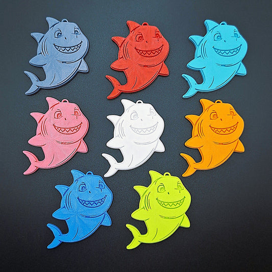 Complete set of eight vibrant shark keychains—fun marine animal keyring collection for kids, party bags, or beach-themed gifts and souvenirs.