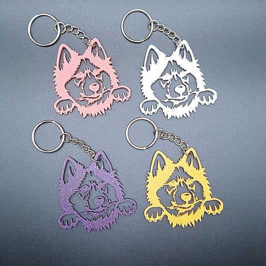 Four Siberian Husky keychains in assorted colors showing a sleek breed profile, crafted from sustainable PLA for pet lovers and dog-themed gifts.
