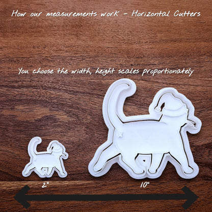 Sizing guide for the Cat Butt Santa Hat cookie cutter showing how scaling works for horizontal cookie cutters.