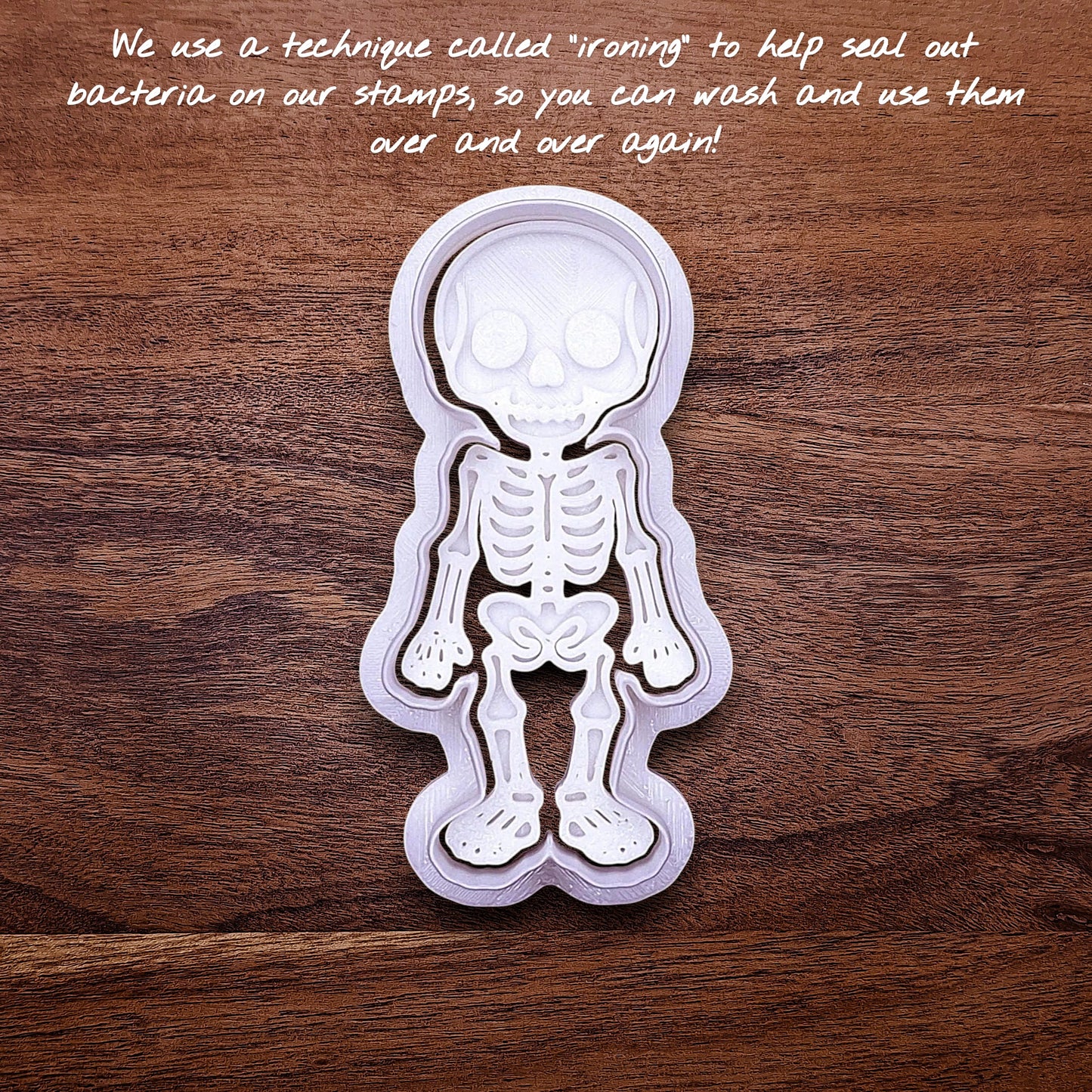 Skeleton cookie cutter with stamp, perfect for outline cookies, fondant toppers, or Halloween crafts.
