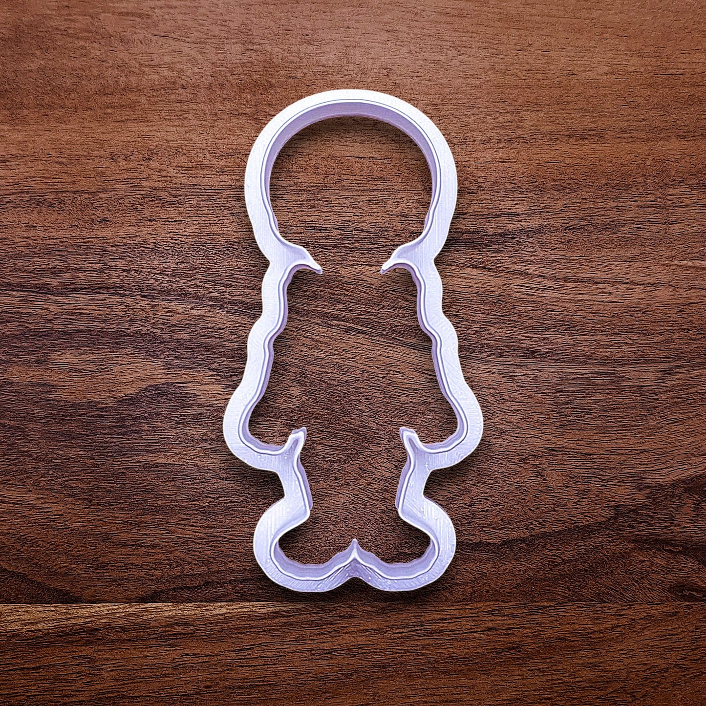Top view of skeleton cookie cutter without the stamp, perfect for outline cookies, fondant toppers, or Halloween crafts.