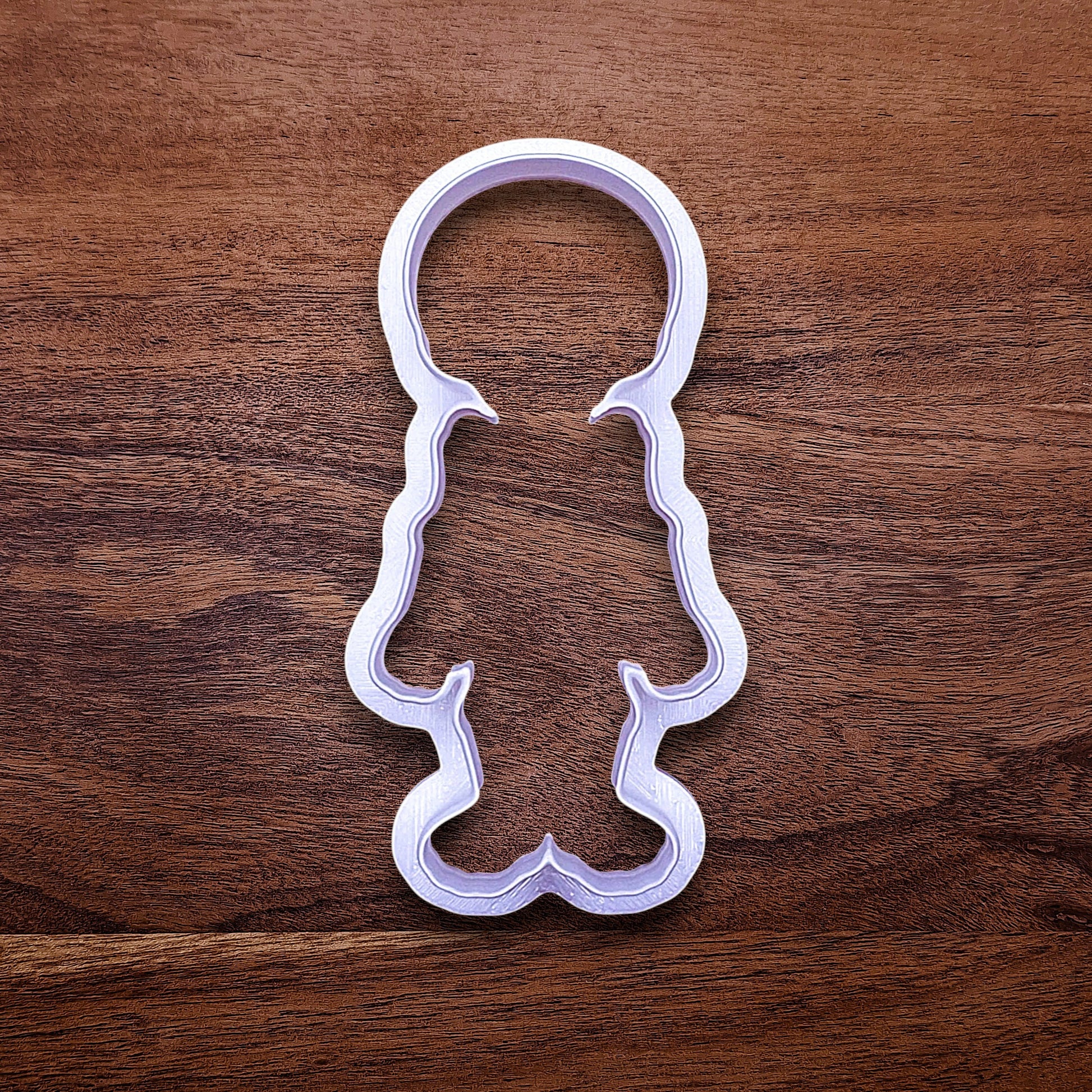 Top view of skeleton cookie cutter without the stamp, perfect for outline cookies, fondant toppers, or Halloween crafts.