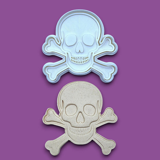 Skull and bones cookie cutter and stamp with dough imprint, perfect for beach parties, Halloween treats, under the sea treats and pirate themed birthdays.