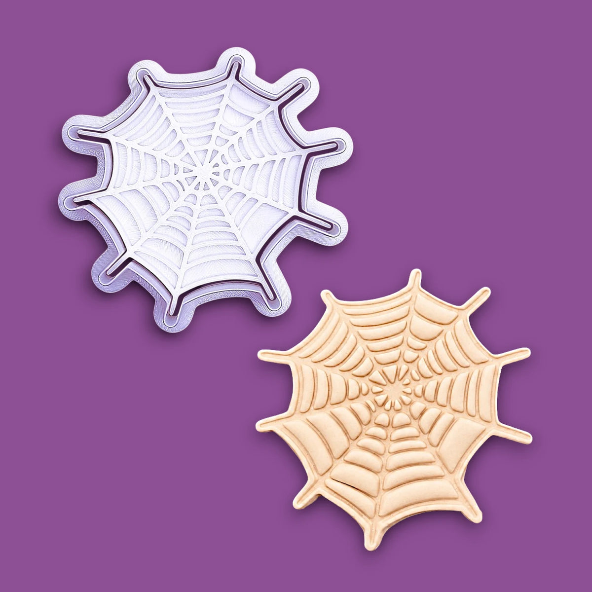 Handmade and customizable Halloween spiderweb cookie cutter and stamp alongside a spiderweb dough cutout and imprint, perfect for fall parties, events, trick or treats, and gifting.