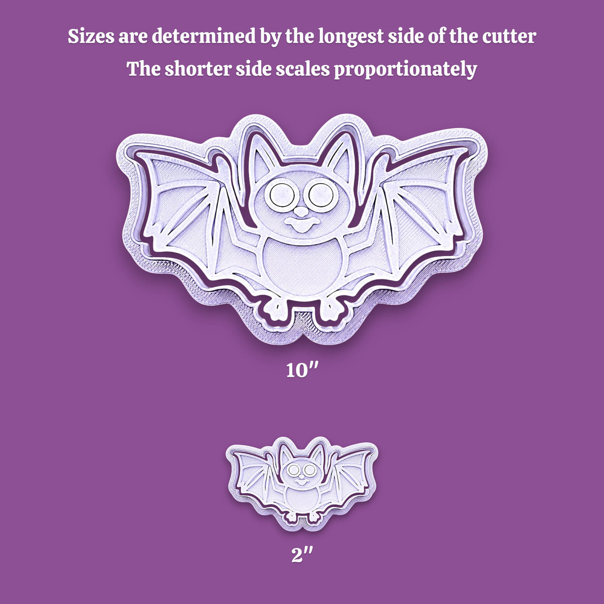 Bat-shaped cookie cutter shown in two sizes on a purple background, with text explaining that sizes are determined by the longest side of the cutter and that the shorter side scales proportionately. The larger cutter is labeled 10 inches and the smaller one 2 inches.