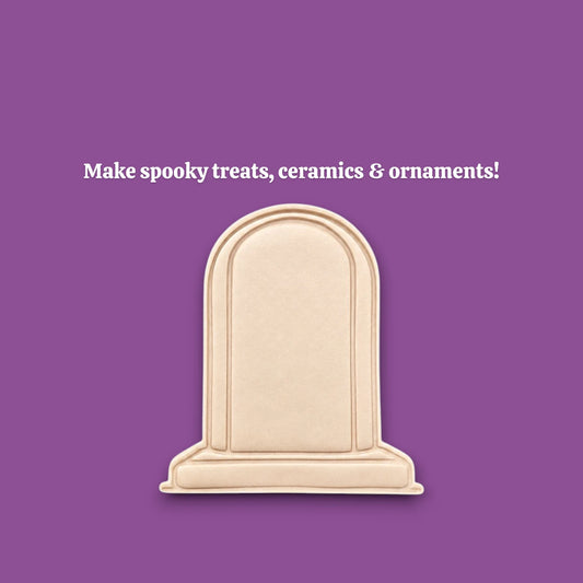 Gravestone cookie dough cutout and imprint, great for spooky Halloween treats and graveyard-themed desserts.