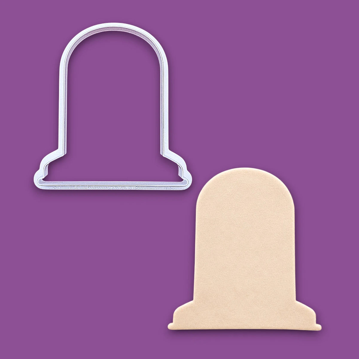 Tombstone cookie cutter and dough cutout, ideal for bold Halloween cookies or centerpiece graveyard treats.