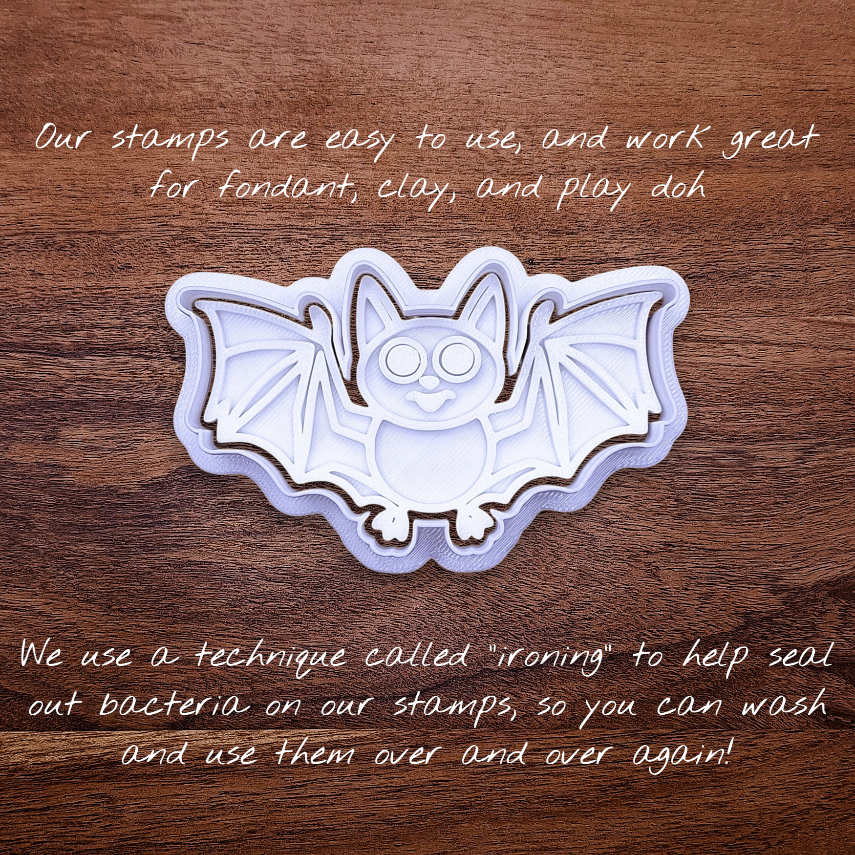 Close-up of bat cookie cutter with matching stamp, perfect for spooky Halloween cookies, fondant crafts, and gothic-themed baking projects.