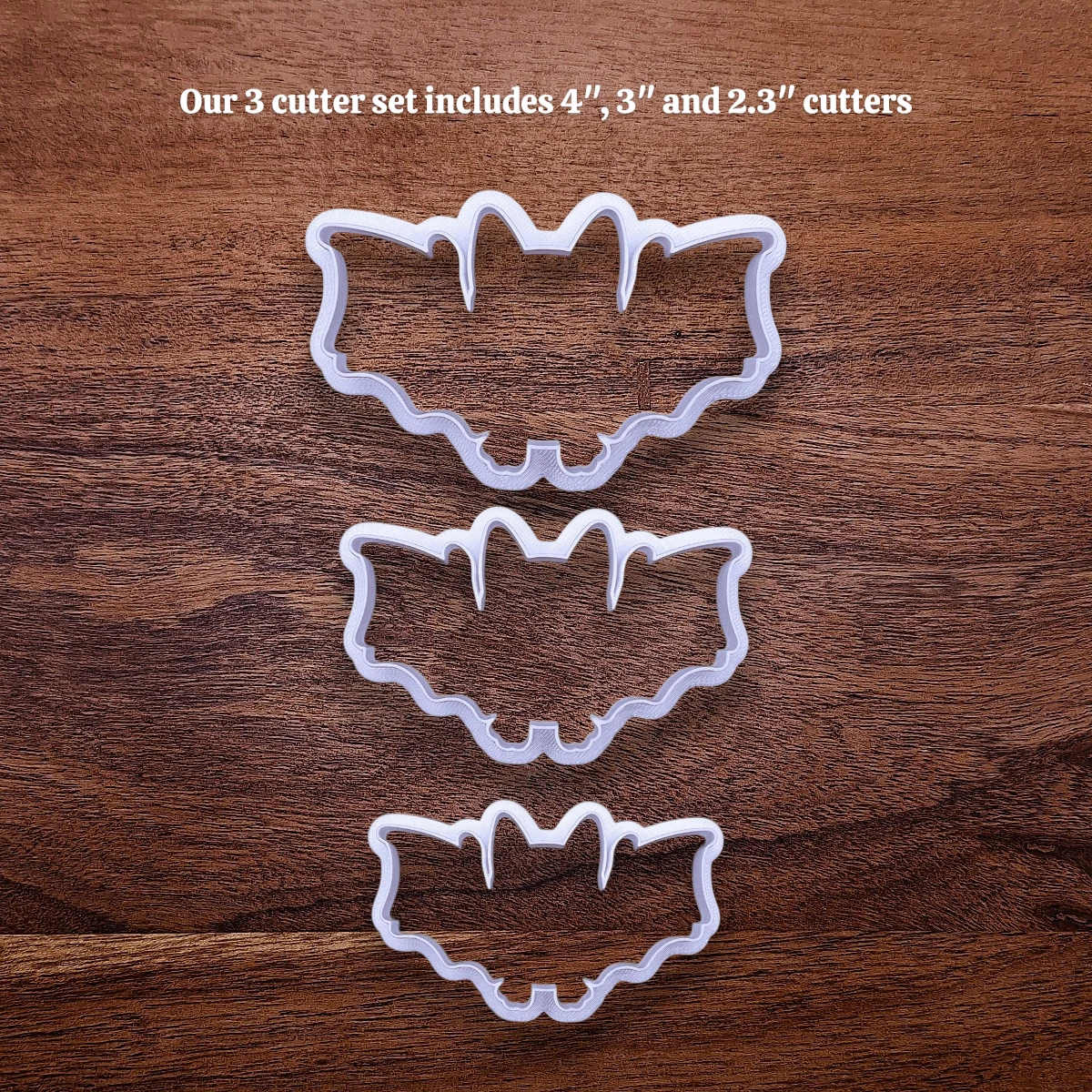 Set of three bat cookie cutters in small, medium, and large sizes for versatile Halloween and spooky cookie baking.