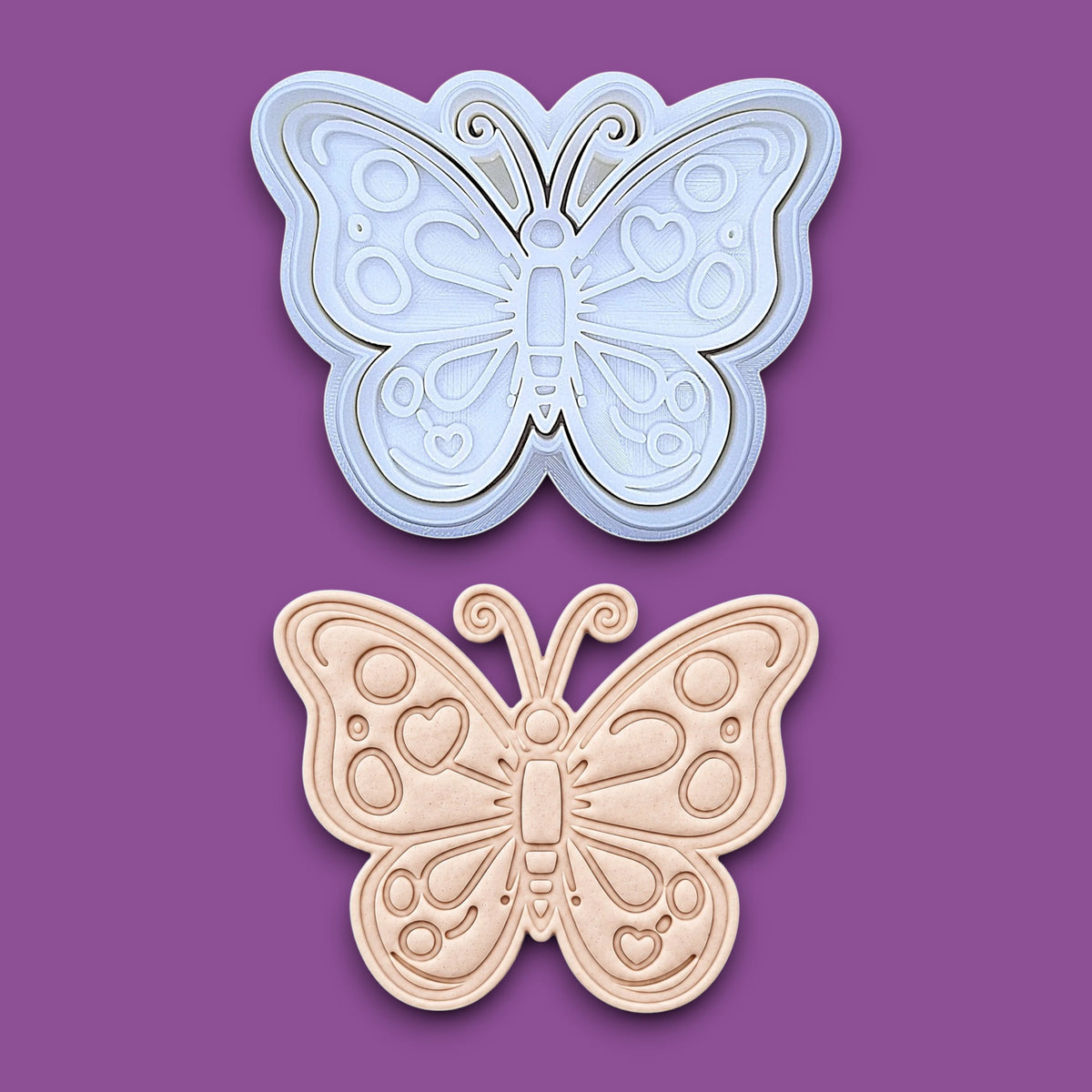 Handmade and customizable butterfly cookie cutter stamp and dough cutout and imprint, perfect for spring baking, garden party treats, birthdays, events, weddings, fondant decorations, and whimsical cookie designs.